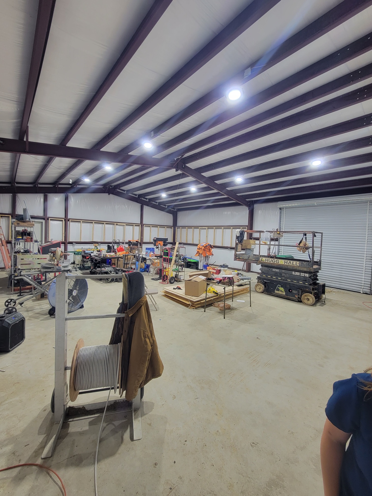 Finished steel building interior with high-bay LED lighting