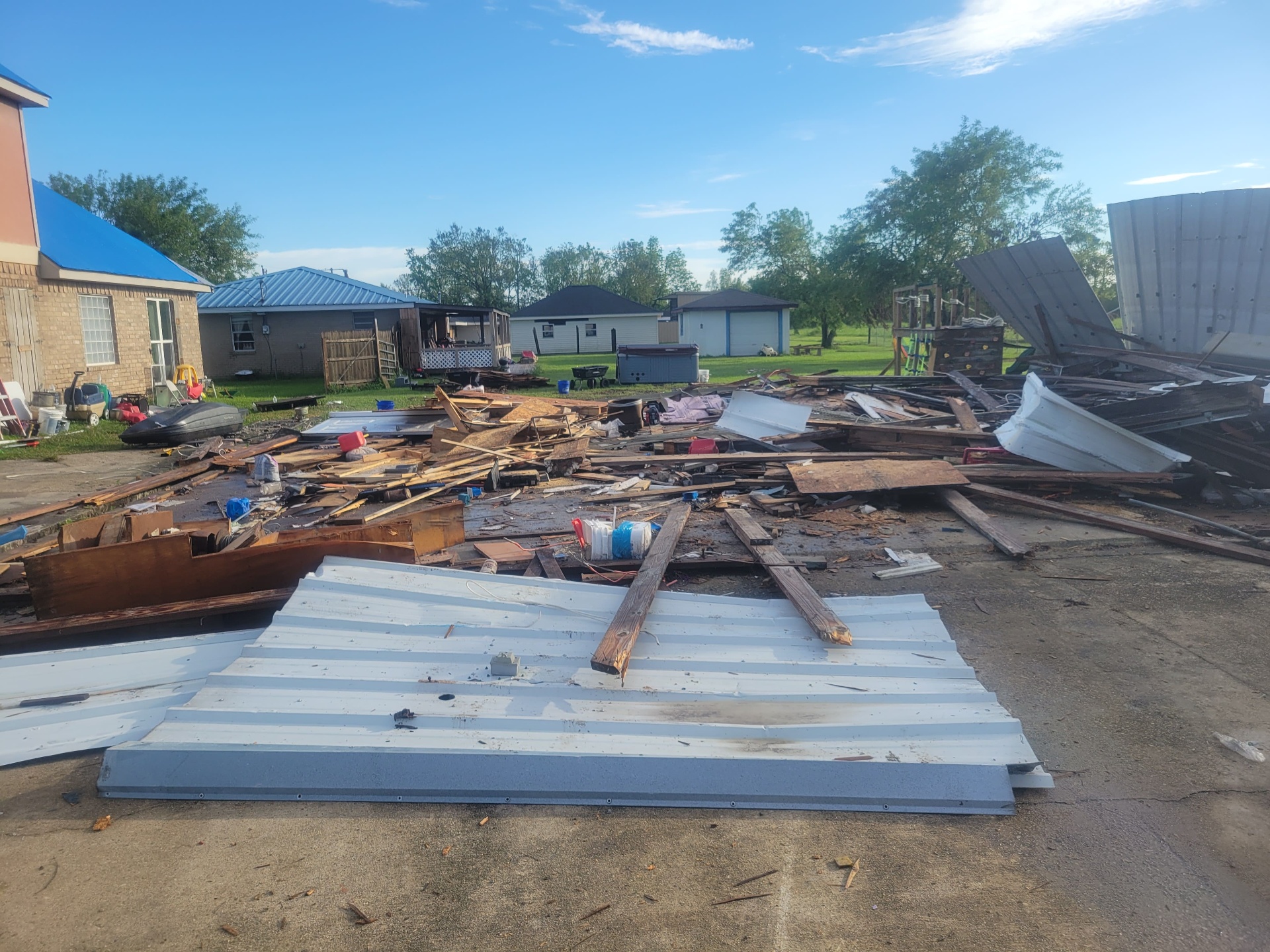 Demolished building reduced to a debris pile on the slab